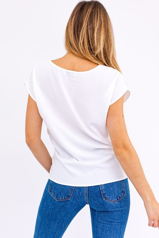 
            
                Load image into Gallery viewer, Short Sleeve Top With Twist Hem Detail
            
        