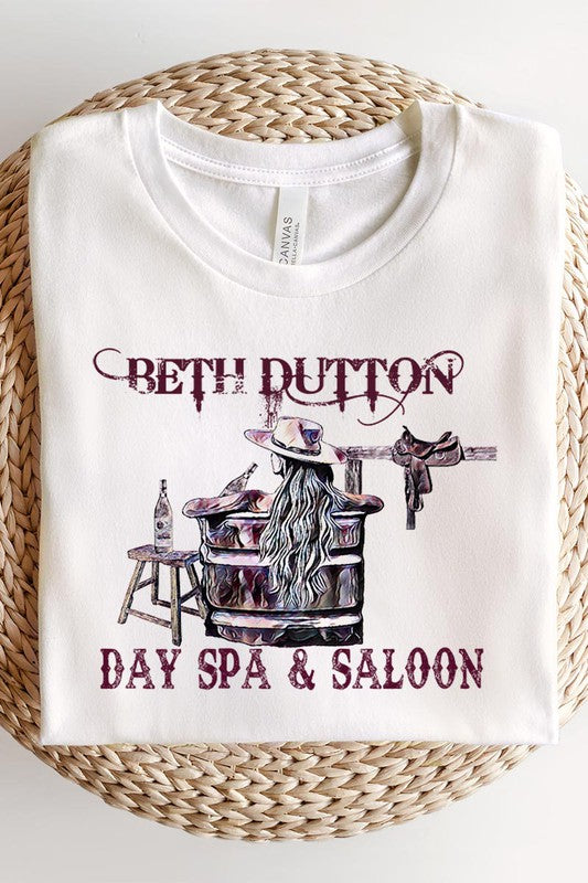 
            
                Load image into Gallery viewer, Beth  Dutton Day Spa &amp;amp; Saloon Tee
            
        
