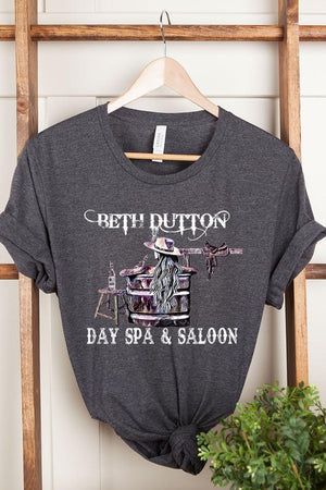 
            
                Load image into Gallery viewer, Beth  Dutton Day Spa &amp;amp; Saloon Tee
            
        
